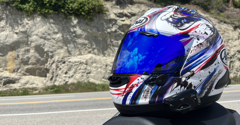 An Arai Corsair-X helmet with a Freecom 4 communication system