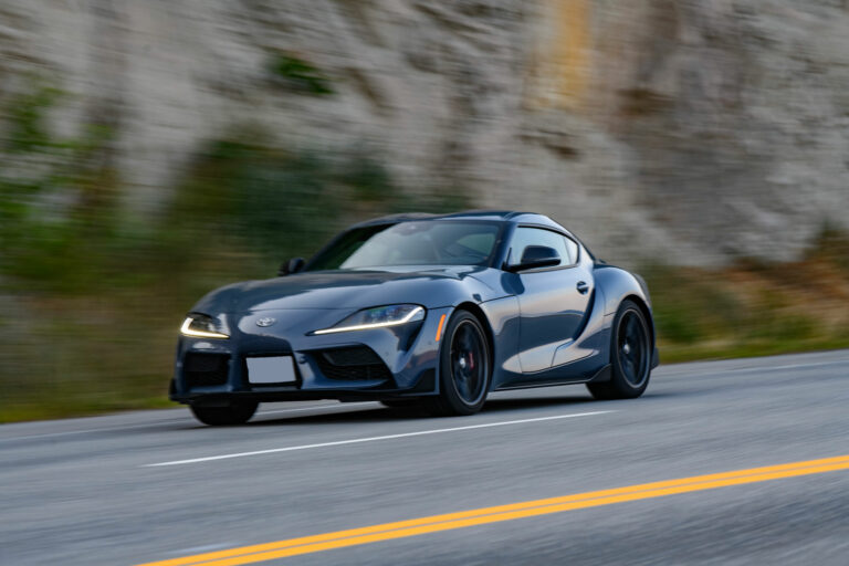 The 2023 Toyota GR Supra A91-MT drives down the highway