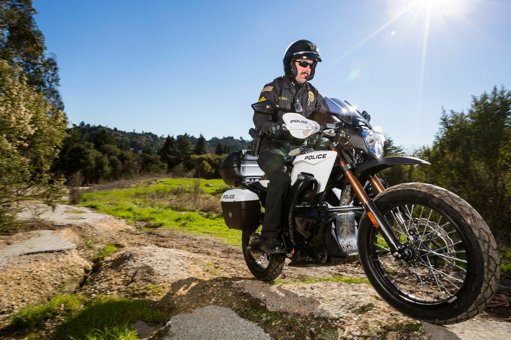 San Mateo Police officer rides a Zero electric motorcycle off road
