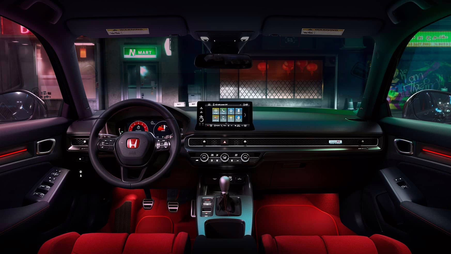 interior of the front seat of a car with manual transmission