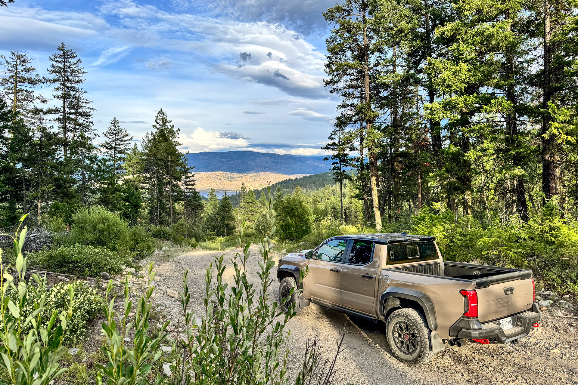 2025 Toyota Tacoma TRD Pro on a gravel road in the mountains