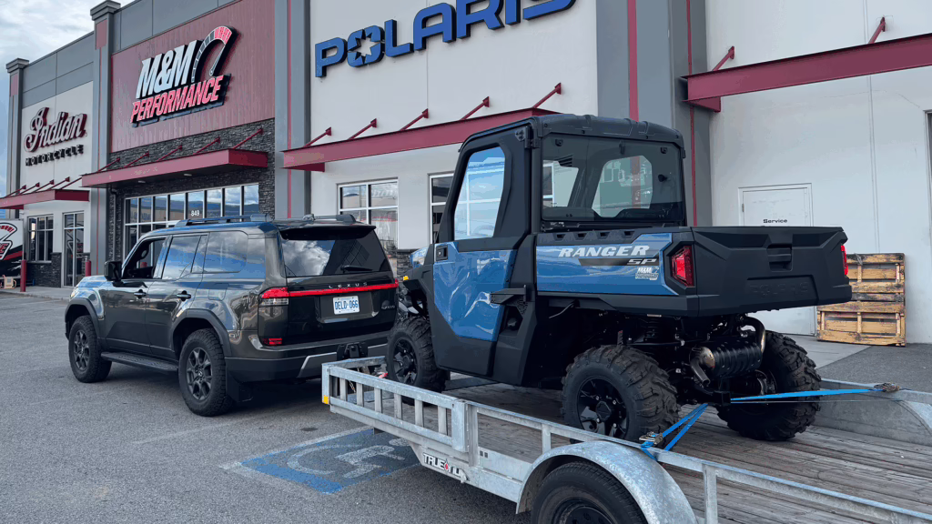 25' Polaris Ranger 570 NorthStar: The Ultimate Trackside Workhorse for Capturing Every Lap 2 A Lexus GX550 Overtrail with a trailer hauling a Polaris Ranger 570 Northstar