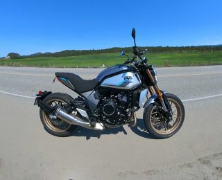 Side profile of a 2023 CFMoto 700 CL-X Heritage motorcycle
